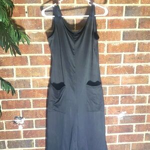 Romper with front pockets.